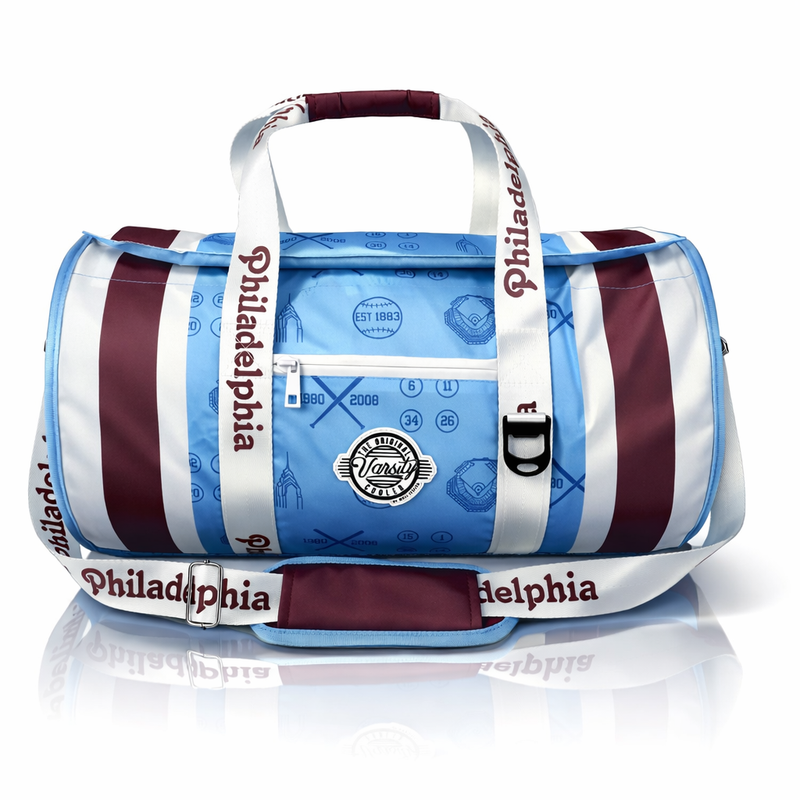 Philadelphia Baseball Varsity duffel cooler, front view with light blue exterior and burgundy accents